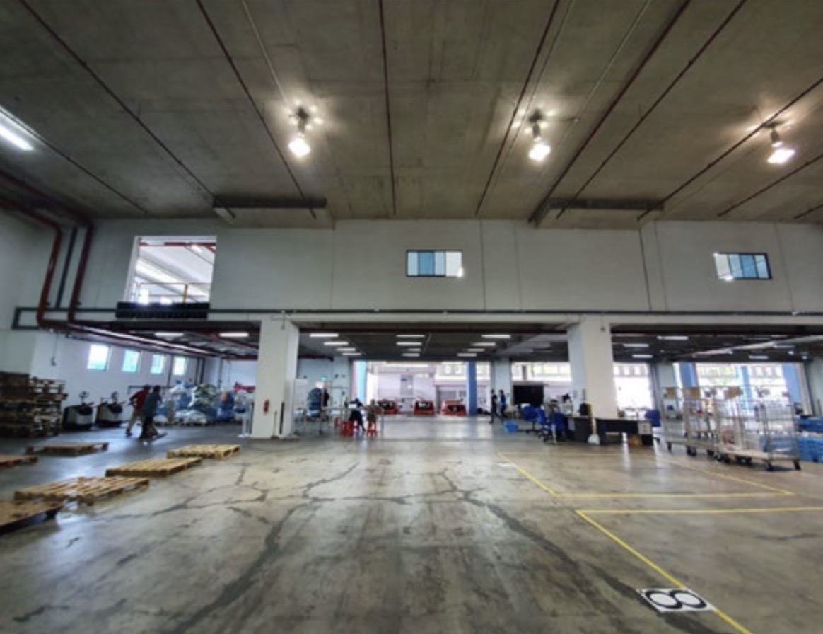 Open warehouse operations floor at 12 Changi North Way with clear span ceiling
